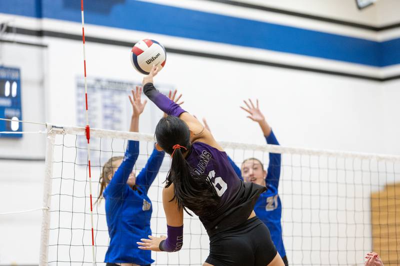 Downer's Grove North's Nicole Liu with the kill shot against St. Charles North on Thursday Oct. 23, 2025 in St. Charles.