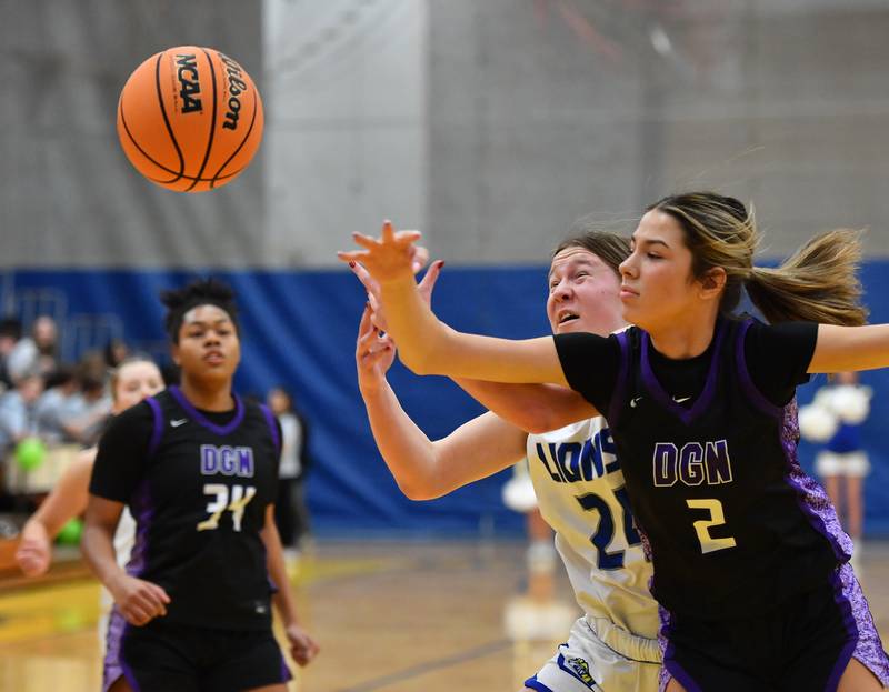 Downers Grove North’s Eva Yerkovich (2) and Lyons Township’s Anna Bigenwald race to a rebound during a game on January 10, 2026 at Lyons Township High School in LaGrange.