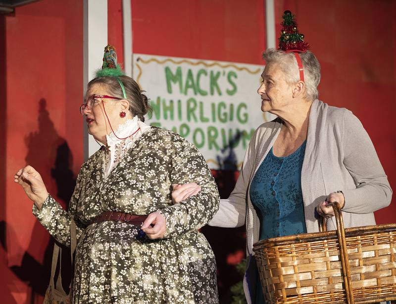 Kristin DuBois (left) and Mary Jo Frederick rehearse a scene Wednesday, Dec. 4, 2024, for Polo Area Community Theatre’s rendition of “Fruitcakes.”