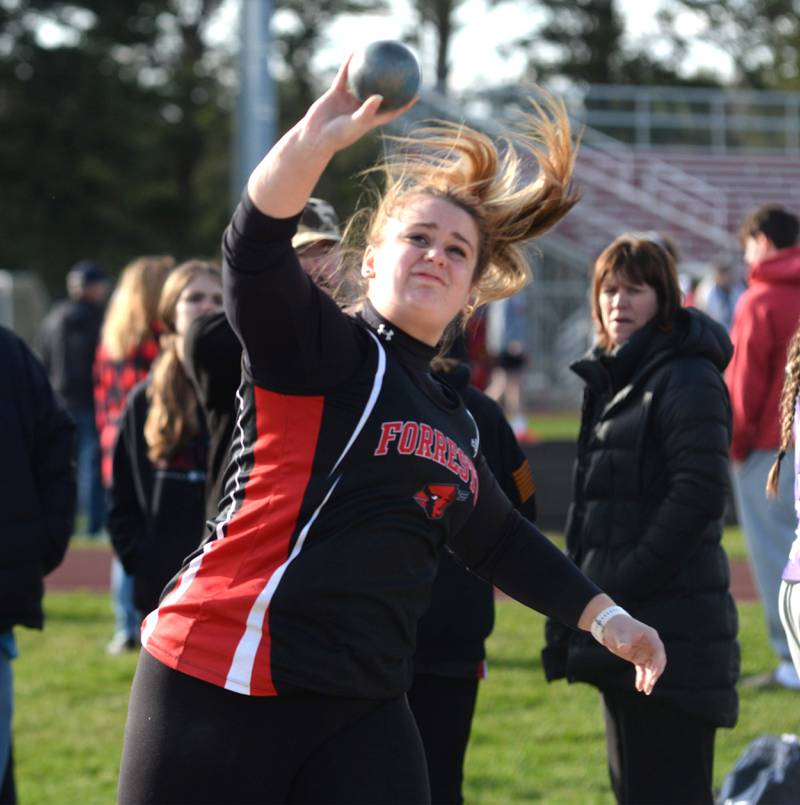 Forreston-Polo's Alayna Young throws the shot during a quad meet at Oregon High School on Thursday, April 3, 2025. She finished third in the event.