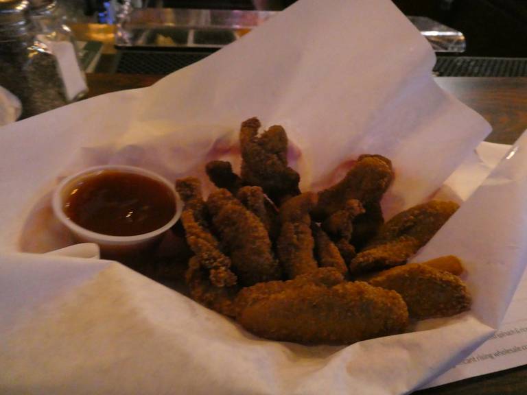 The almond-crusted duck tenders at Labemi's Tavern in downtown Crystal Lake. The sauce on the side is mango-jalapeno.