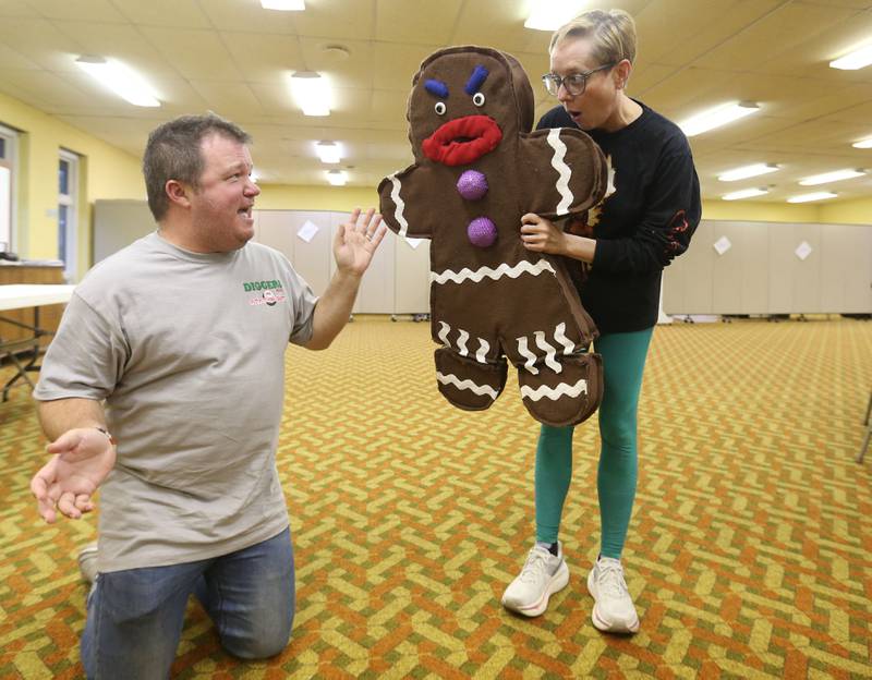 Joel Shoemaker and Monika Sudakov, act out a scene during a rehearsal of Shrek the Musical on Monday, Oct. 13, 2025 at the Henry United Methodist Church. The River Valley Players are staging Shrek the Musical, with performances scheduled for Nov. 15-16 and 21-22, 2005 at the Henry United Methodist Church in Henry