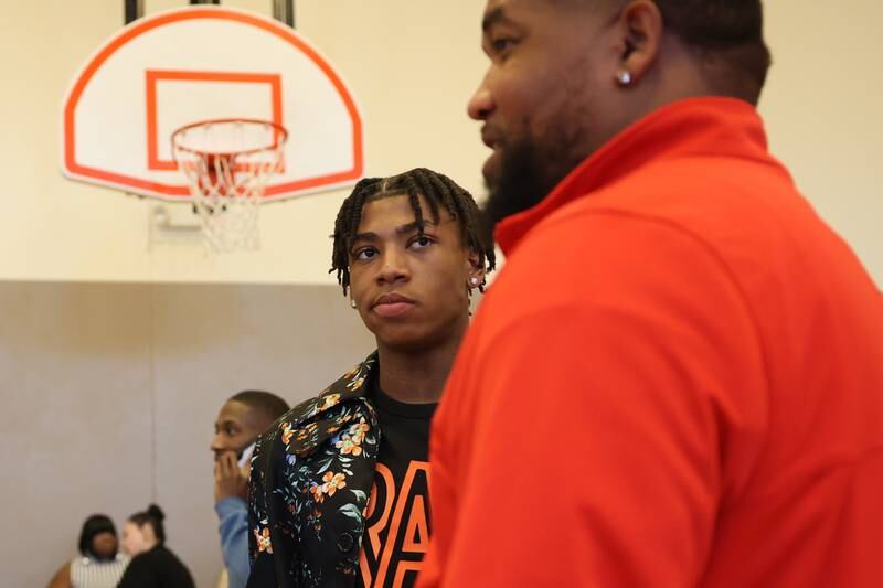 Jeremy Fears Jr. talks with a guest at the Salvation Army Community Center. Friends and family host a reception for Joliet West’s basketball player Jeremy Fears Jr. before he heads to Houston to play in the All-McDonalds game.