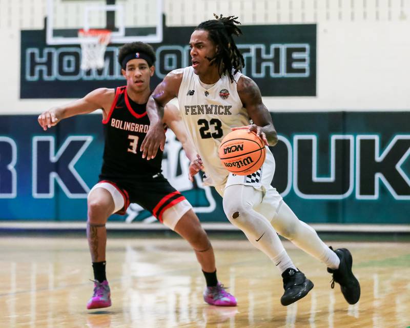 Fenwick's Nate Marshall (23) drives past the defense during their Jack Tosh Holiday Classic basketball tournament Championship game between Fenwick at Bolingbrook. Tuesday Dec 31, 2024 in Elmhurst.