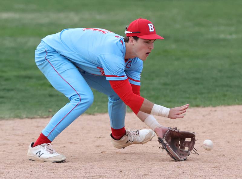 Benet's Luke Bafia (11) fields the ball during the varsity baseball game between Benet Academy and Nazareth Academy in La Grange Park on Monday, April 24, 2023.