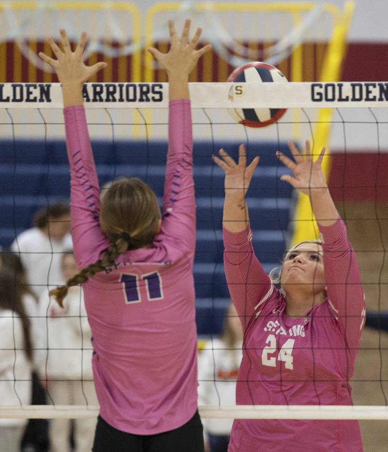 Sterling’s Carley Sullivan plays the ball over the net against Mendota’s Ella Coss Thursday, Oct. 24, 2024, in Sterling.