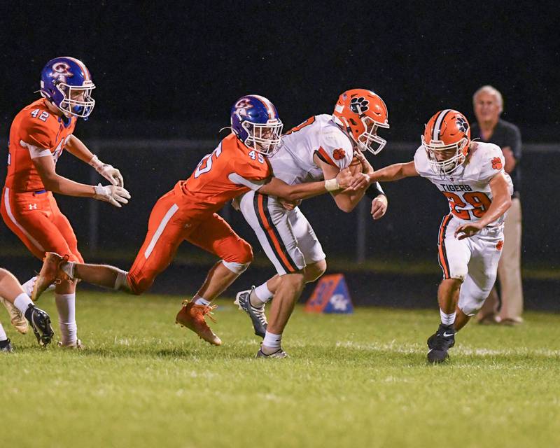 Genoa-Kingston Maddox Lavender (45) brings down Byron’s ball carrier Friday Sep. 16th in the second quarter in front of the home crowd held att Genoa-Kingston High School.