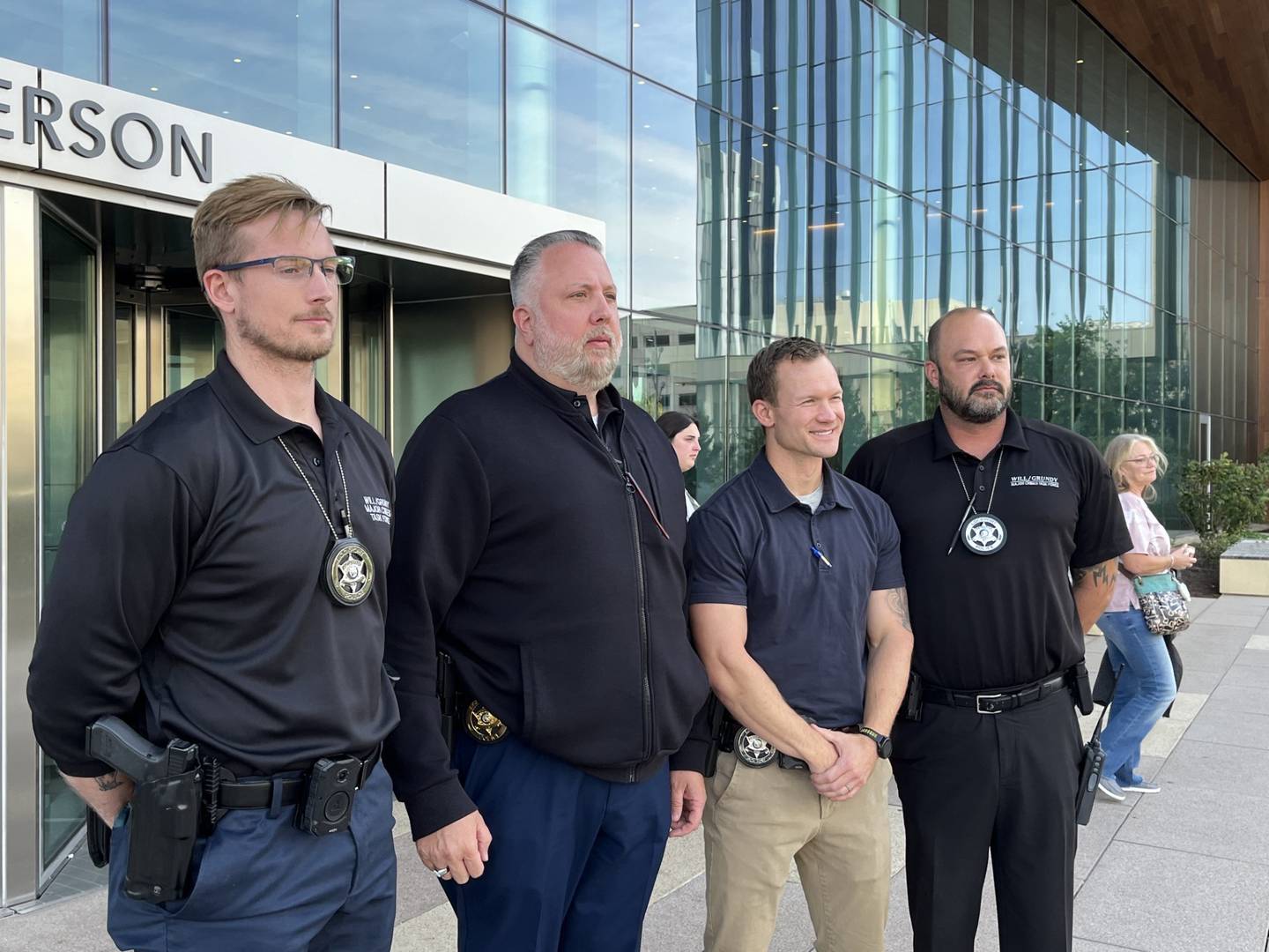 Lockport Police Detectives Dan Brice (left), Cmdr. John Arizzi, Detective Jacob King and Detective Chris Neyhart on Friday, Oct. 11, 2024, outside of the Will County Courthouse in Joliet. King was the lead detective in the case against Anthony Maggio, 30, who was found guilty of the 2020 murder of Ashtin Eaton,  32, and 14-month-old Hazel Bryant.