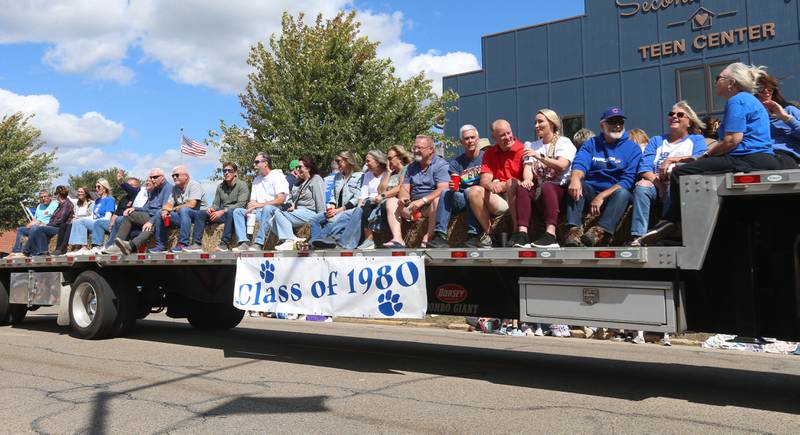 The Princeton High School class of 1980 rides on a float during the 54th annual Homestead Festival parade on Saturday, Sept. 6, 2025 in Princeton.