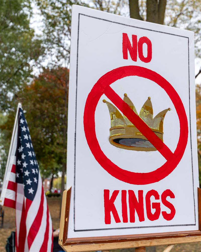 Sign is held at the ‘No Kings 2.0’ Protest on Saturday, October 18, 2025 at Washington Square Park in Ottawa.