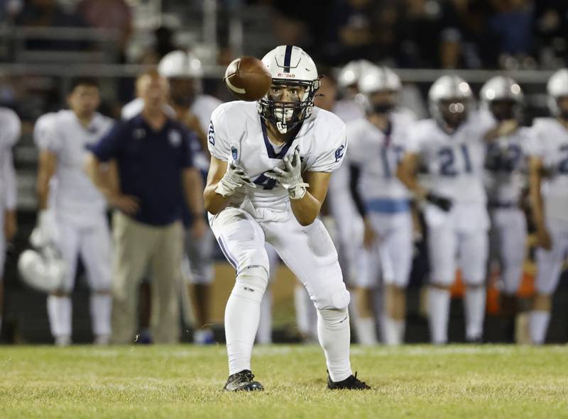 Plainfield South's Chase Pierceall (4) waits for the ball during the varsity football game between Plainfield South and Oswego East on Friday, Sep. 20, 2024 in Oswego.
