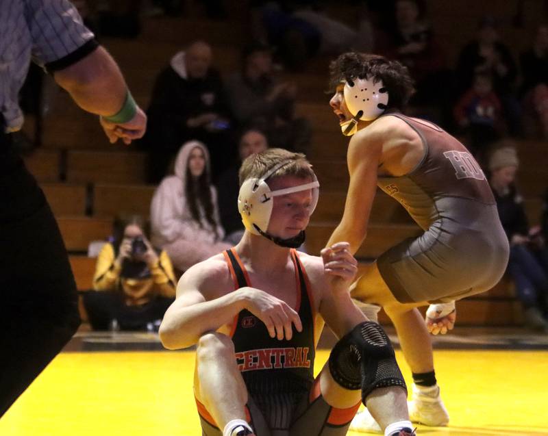 Jacobs’ Enrique Garcia, right, hops to his feet after winning against Crystal Lake Central’s Peyton Ramsey at 120 pounds in varsity wrestling on Thursday, Jan. 16, 2025, at Jacobs High School in Algonquin.