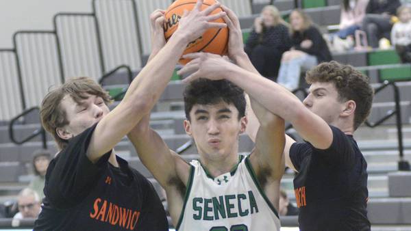 Photos: Seneca boys basketball defeats Sandwich 64-56