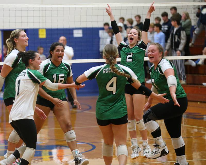 Members of the Rock Falls volleyball team react after defeating Fieldcrest in the Class 2A Sectional semifinal game on Monday, Oct. 30, 2023 at Princeton High School.