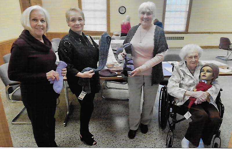 Pictured are Daughters of American Revolution members Juanita Tarrence, Nancy Gartner, Presenter Doris Streit, and Agnes Ross holding some of the many items Streit brought to browse and shop.