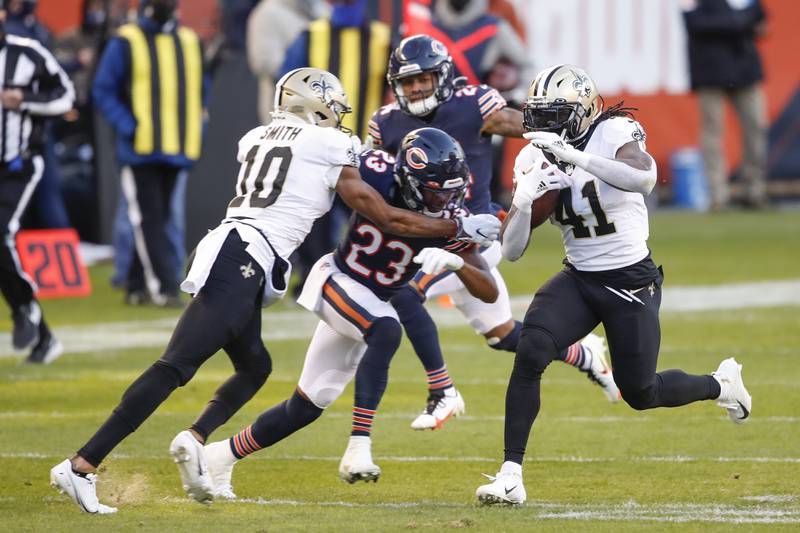 New Orleans Saints running back Alvin Kamara (41) rushes with the ball against the Chicago Bears during the first half of an NFL football game, Sunday, Nov. 1, 2020, in Chicago. (AP Photo/Kamil Krzaczynski)