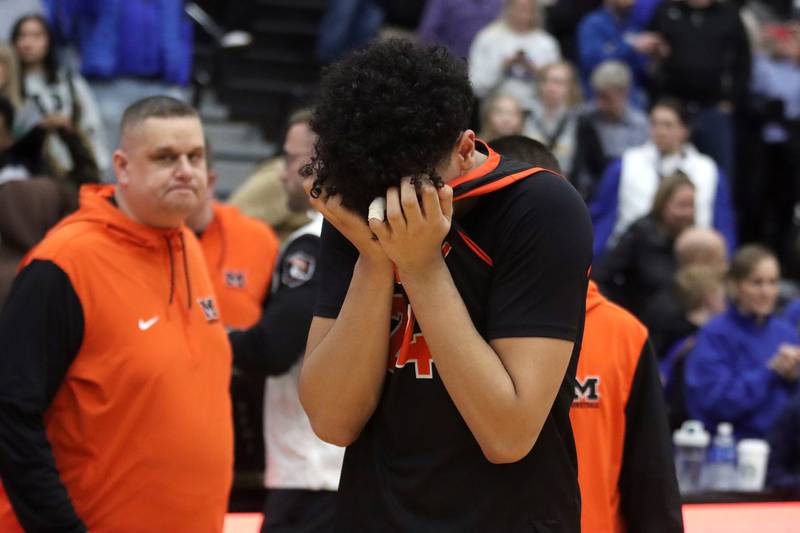 McHenry’s Adam Anwar walks off the court after a loss to Warren in IHSA Class 4A Regional Title Game boys basketball action on Friday, Feb. 28, 2025 at McHenry High School in McHenry.