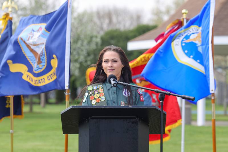 Alexis McCullough speaks to the crowd of over 150 people attending the Gold Star Families Memorial Monument dedication ceremony at Marcotte Park in Bourbonnais on Saturday, April 26, 2025. The project was planned and fundraised for by 17-year-old McCullough, of Bourbonnais, for her Eagle Scout project in honor of her father, Col. Mark McCullough.