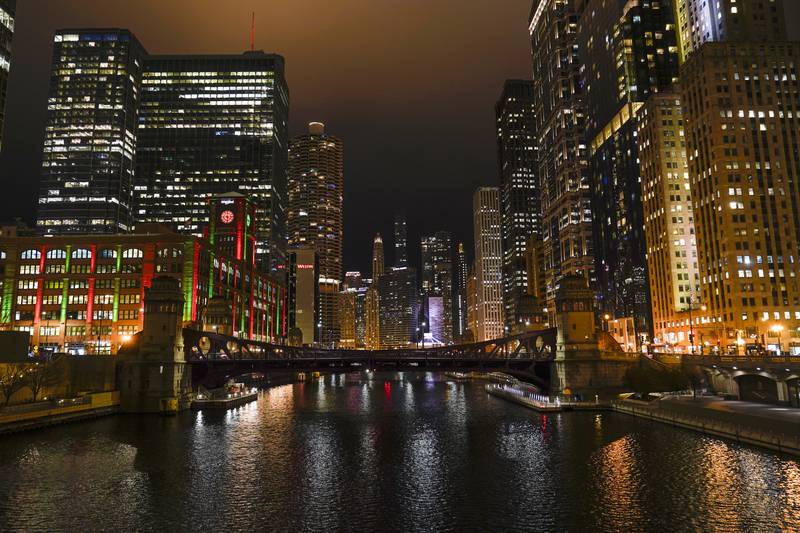 The Chicago skyline is seen along Chicago River Nov. 28, 2022, in Chicago. Democrats have chosen Chicago to host their 2024 national convention. (AP Photo/Kiichiro Sato, File)