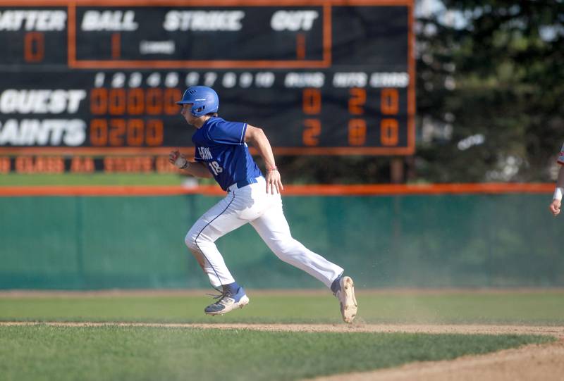 Wheaton North's Jake Williams runs to third during a game against St. Charles East on Wednesday, April 23, 2025 in St. Charles.