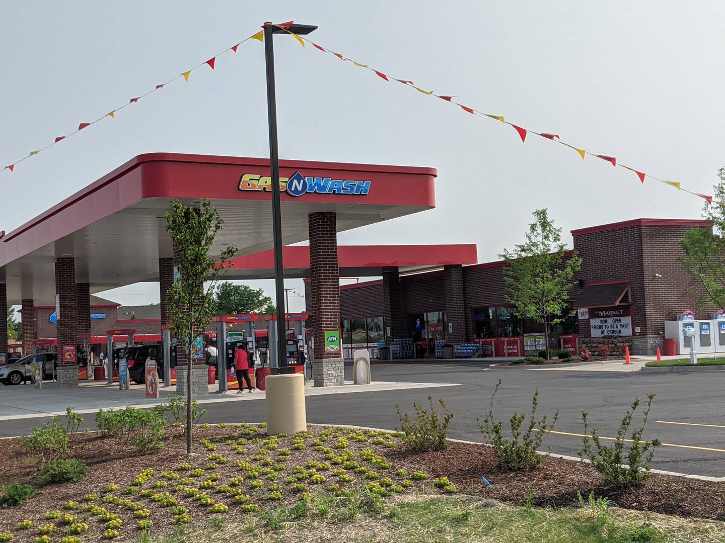 Scooter’s Coffee and Woodie’s Wings will be part of the offerings at the convenience store at Gas N Wash which recently opened on about 10 acres at the northeast corner of Orchard and Mill roads.