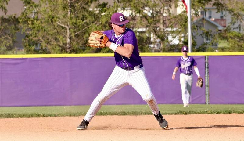 Rochelle's Brode Metzger throws from shortstop to get an out during the Hubs' game with Marengo.