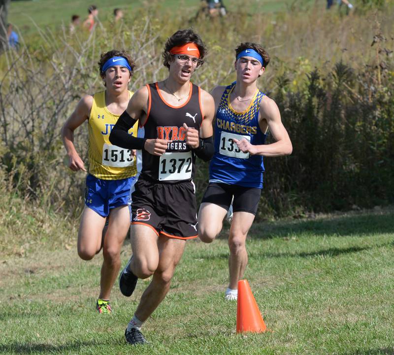 Byron's Tim Starwalt (center) runs at the Amboy Invitational on Monday, Oct. 14, 2024. He finished third in the event.