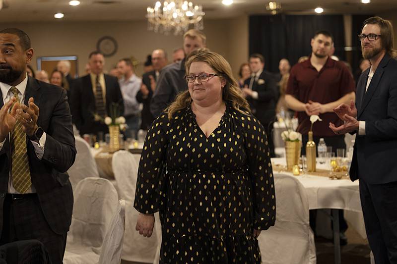 Heather Grobe steps up to the stage after being named one of the Four under 40 award winners Friday, April 5, 2024 at the Best of Dixon Awards.