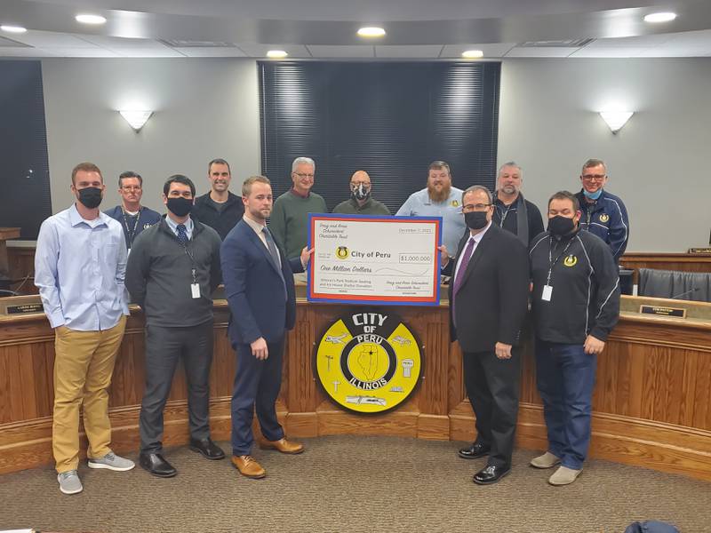 During Tuesday's meeting, the Doug and Rorie Schweickert Charitable Trust presented a check for $1 million to the city.