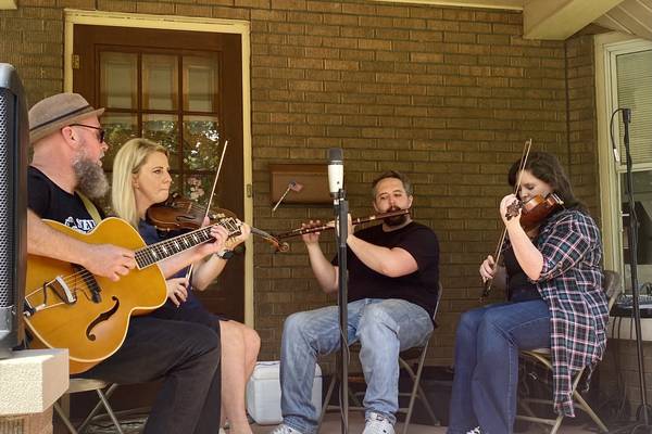 From blues to bluegrass: Music fills Joliet’s Cathedral District during free Porch & Park Fest  