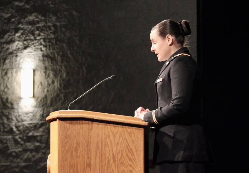 U.S. Army Capt. Taylor J-Beebe Cox, logistics officer for the Army Sustainment Command at the Rock Island Arsenal, gives the Veterans Day address on Friday, Nov. 22, 2022, at Sterling High School Centennial Auditorium.