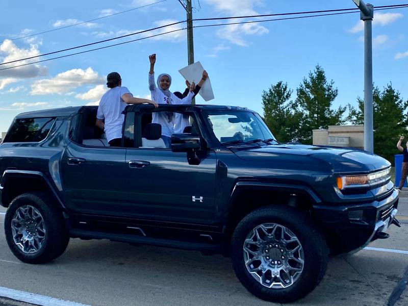 DeKalb students throw candy to eager onlookers at the annual DeKalb High School Homecoming Parade on Wednesday, Sept. 24, 2025, along West Dresser Road.