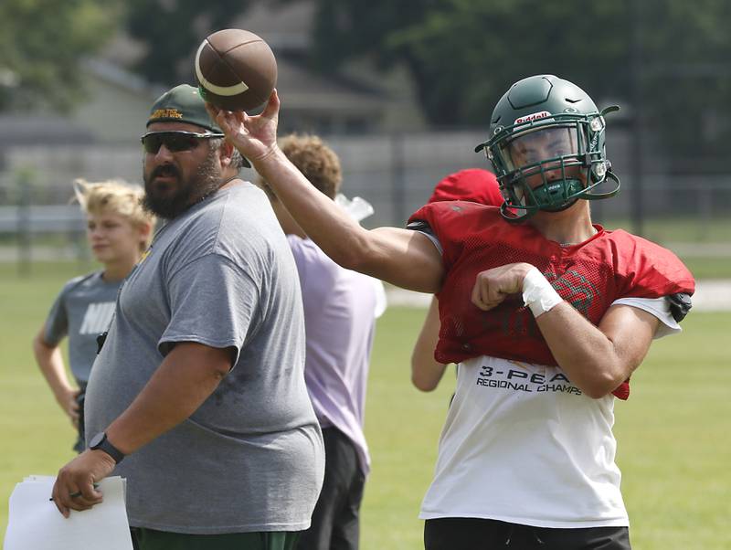 Crystal Lake South’s Michael Silvius throws a pass during football practice on Wednesday, July 23, 2025, at Crystal Lake South High School.