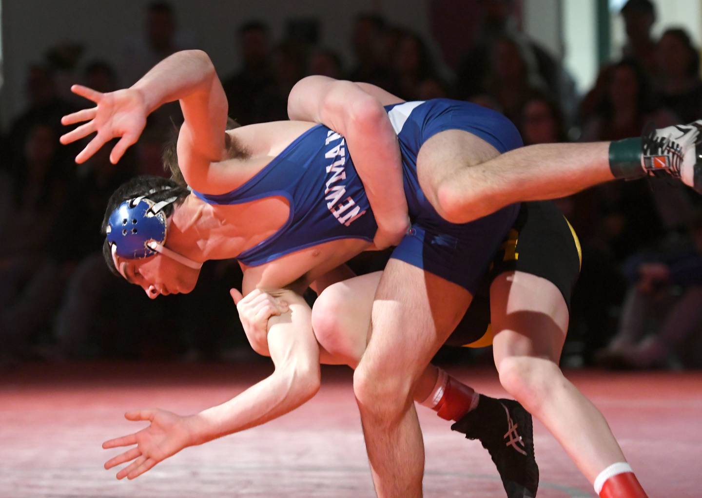 Newman's Carter Rude gets thrown by Riverdale's Brock Smith during the 138-pound championship match during the 1A Oregon Wrestling Sectional on Saturday. Smith won the match, but both wresetlers advance to the state finals.