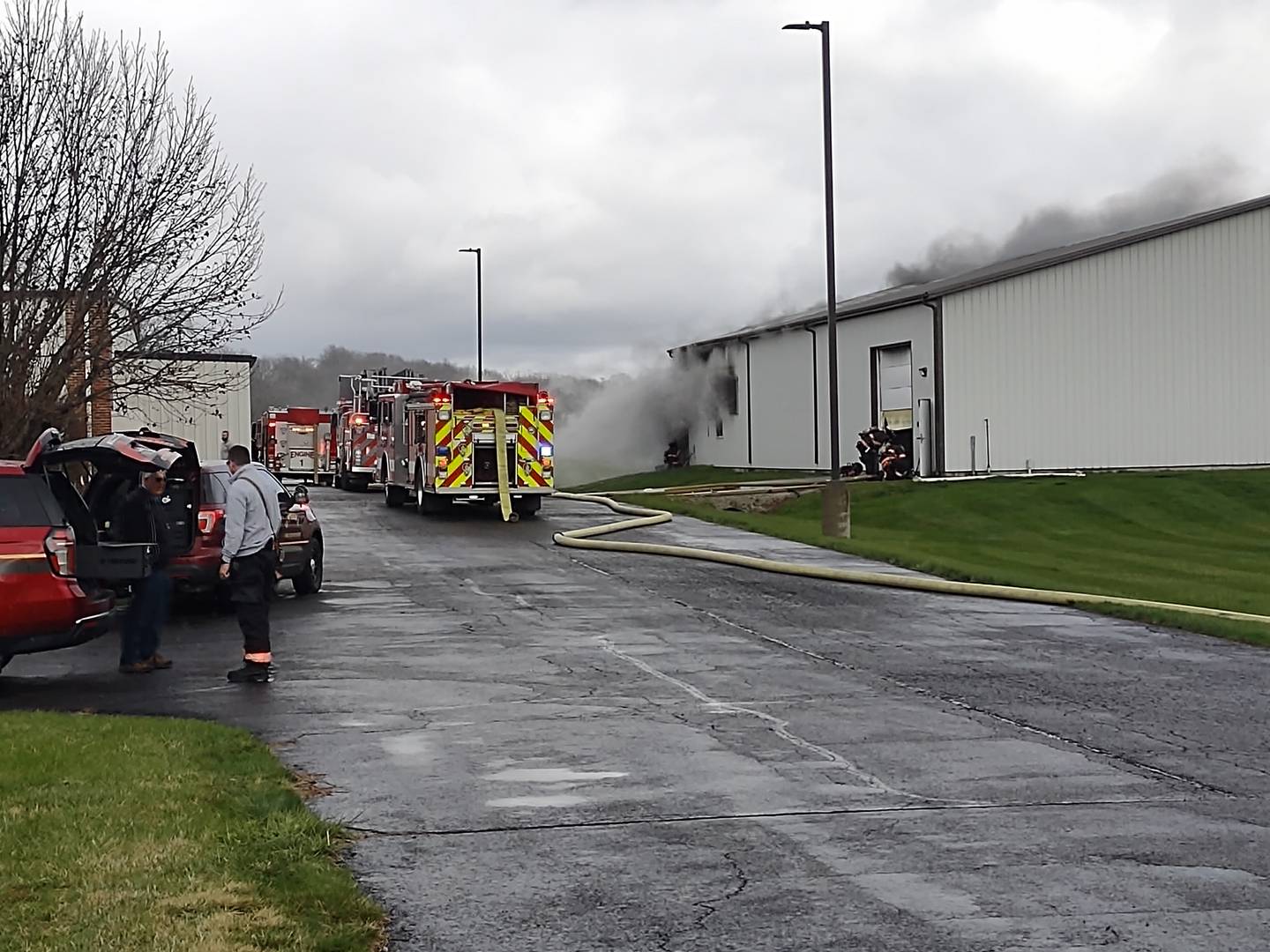 Smoke comes from a warehouse Thursday, April 4, 2024, at MTC Voyager Corp. on Titanium Drive in Ottawa.
