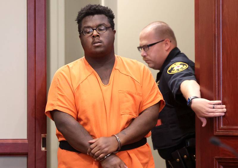 Timothy M. Doll, 29, of DeKalb, is escorted by DeKalb County Sheriff’s officers as he enters courtroom 210 in the DeKalb County Courthouse in this Shaw Local file photo on Wednesday, June 14, 2023. He pleaded guilty on Feb. 5, 2025, to murder in the May 2023 slaying of 15-year-old Gracie Sasso-Cleveland.