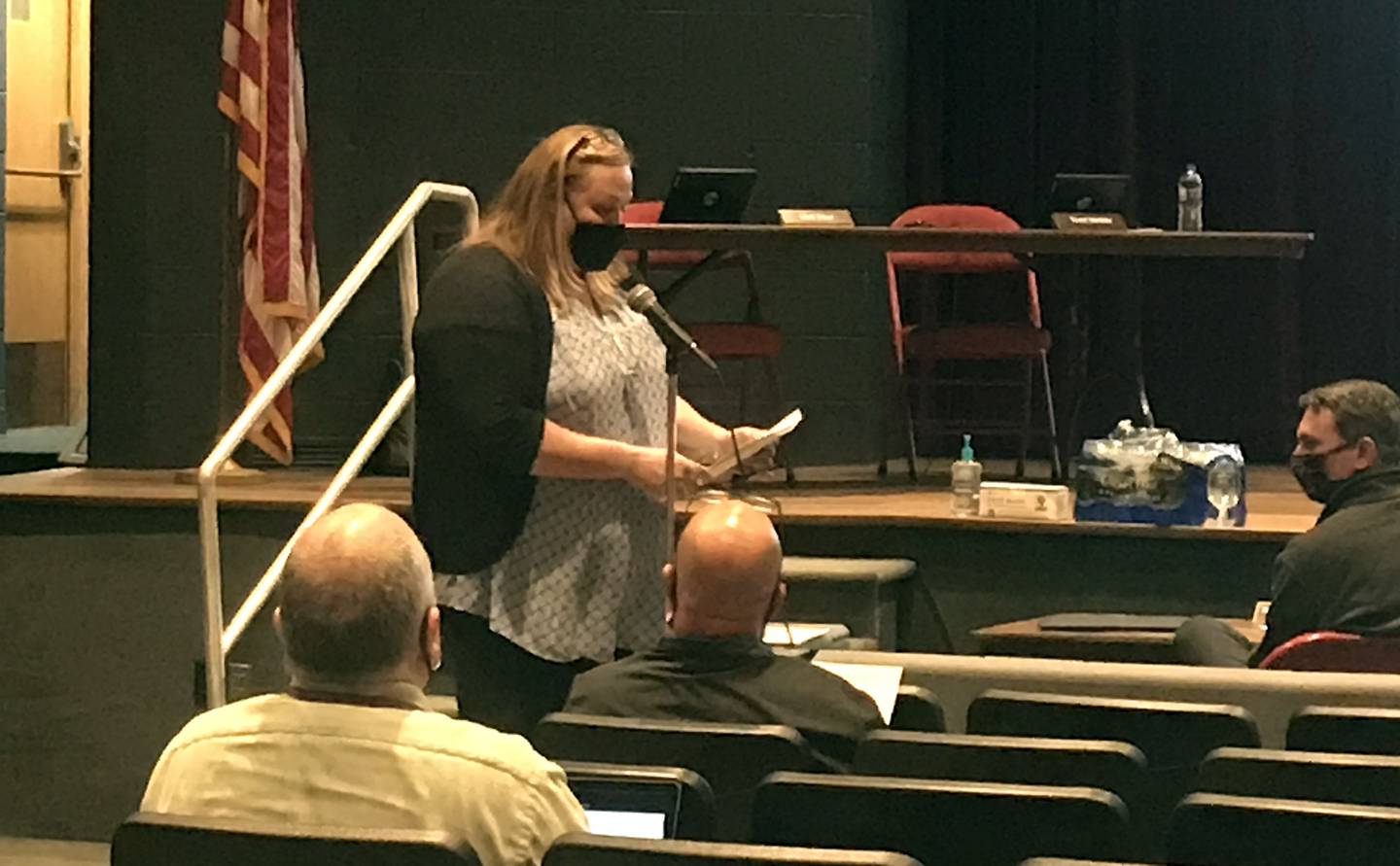 Mascot Committee member Adrianne McKerrow introduces the committee's presentation Monday at the District 101 Board meeting.