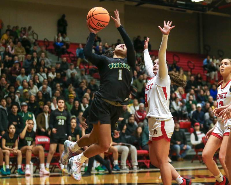 Waubonsie Valley's Arianna Garcia (1) puts up a off balanced shot during their Class 4A Bolingbrook Sectional final basketball game between Waubonsie Valley at Benet. Feb 27, 2025 in Bolingbrook.