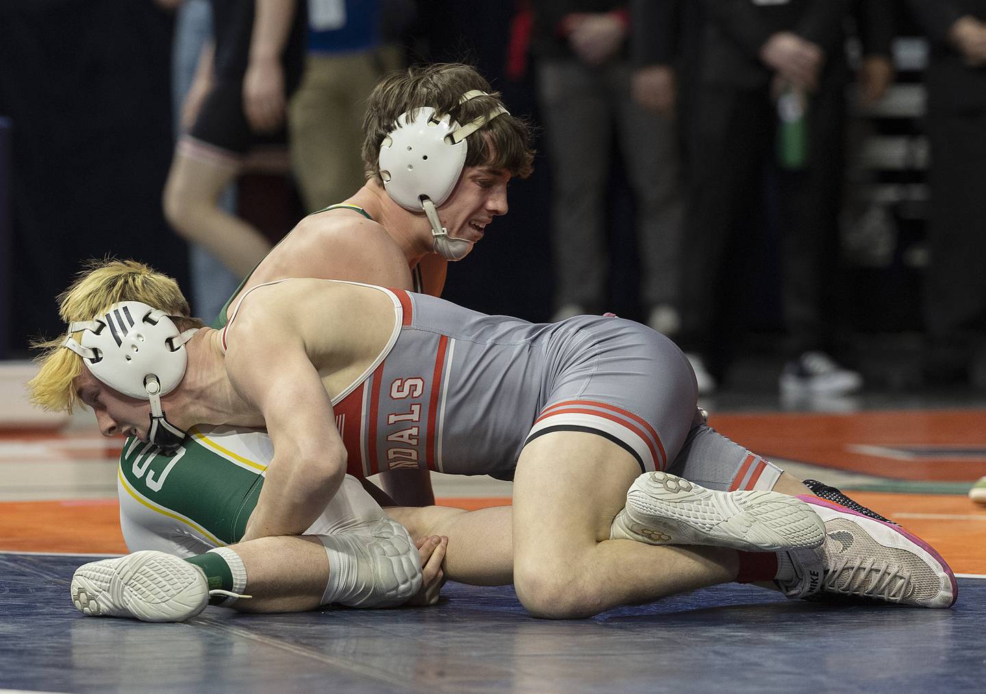Coal City’s Cooper Morris (top) and Vandalia’s Tyson Waughtel compete in the 126 pound weight class of the 1A state individual wrestling finals Saturday, Feb. 22, 2025, at State Farm Center in Champaign.