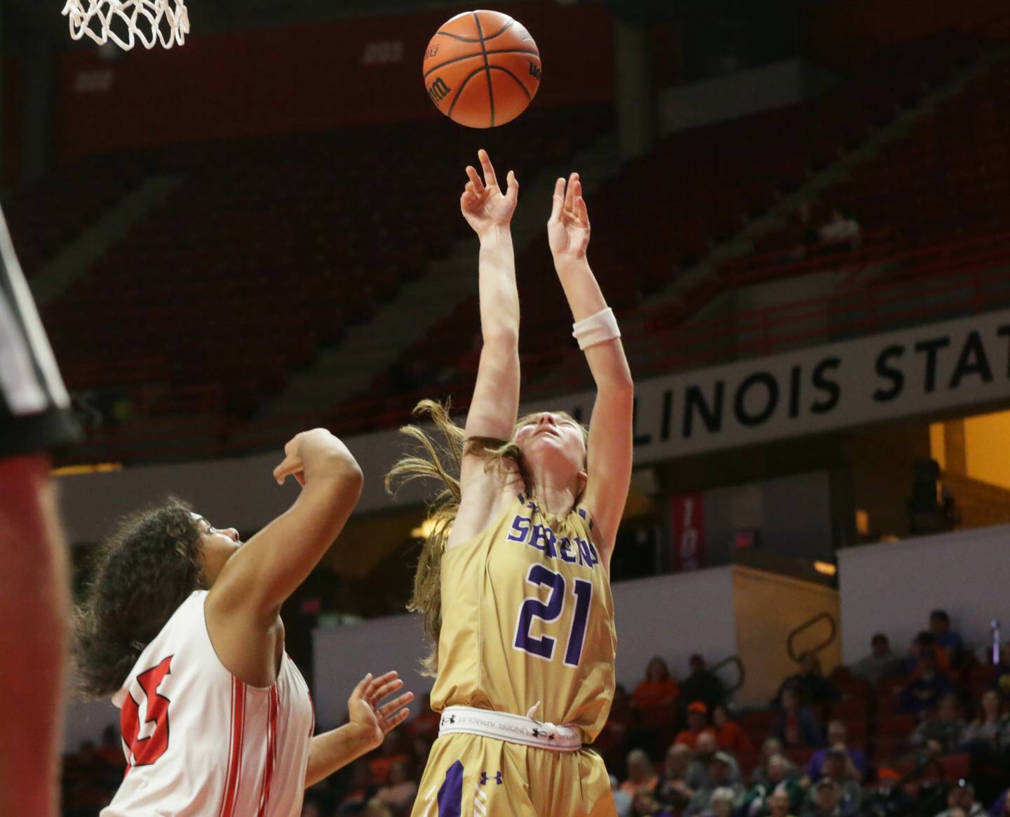 Serena's Makayla McNally (21) shoots a jumper over Neoga's Halee Campbell (45) in the Class 1A third-place game on Thursday, March 3, 2022, at Redbird Arena in Normal.