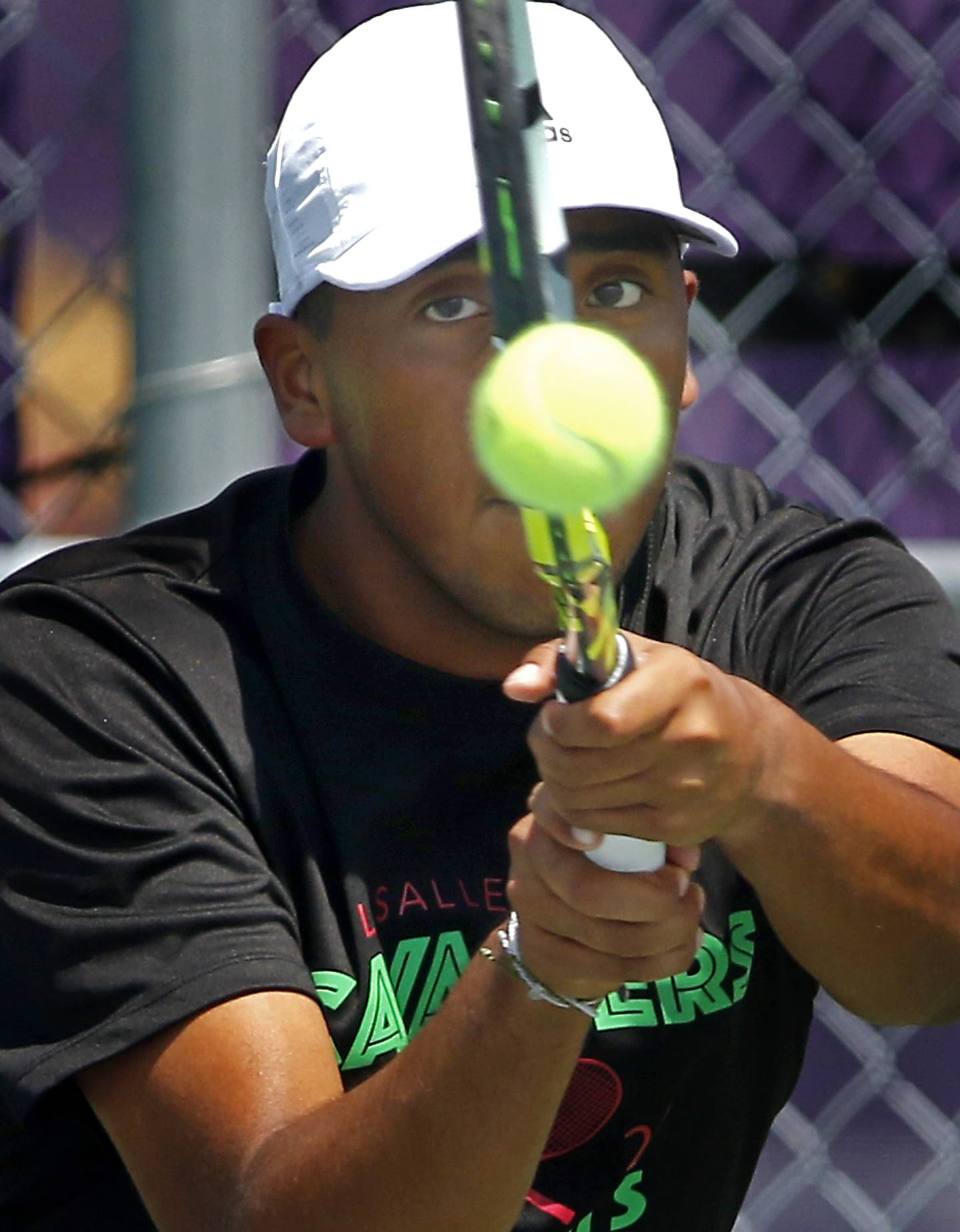 LaSalle-Peru's Daniel Santoy returns the ball as he competes in the Class 1A Boys Doubles State Tennis Tournament on Thursday, May 23, 2024, at Rolling Meadows High School in Rolling Meadows.