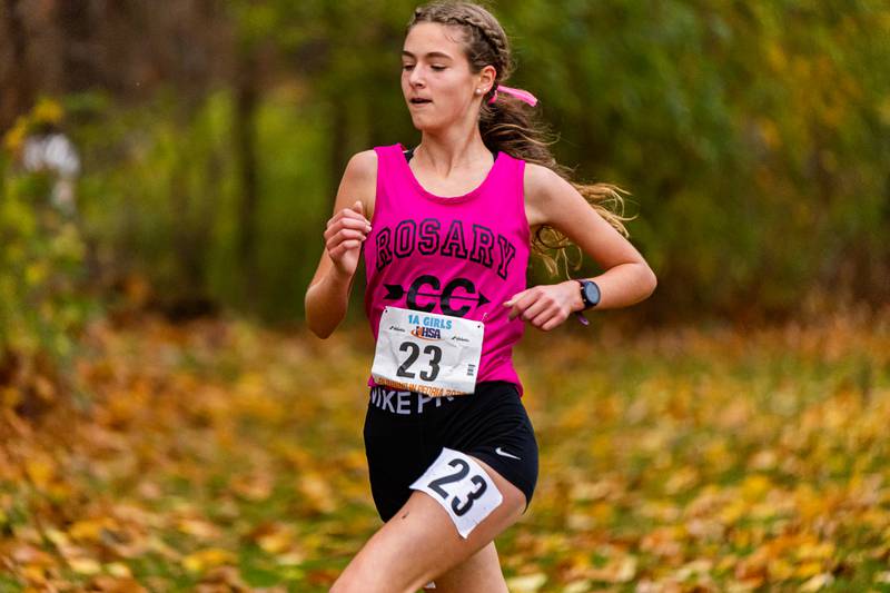 Rosary sophomore Chiara Surtz running at the Class 1A state meet in Nov. Photo courtesy of Christian Surtz of SurtzMedia, LLC and Rosary Athletics.
