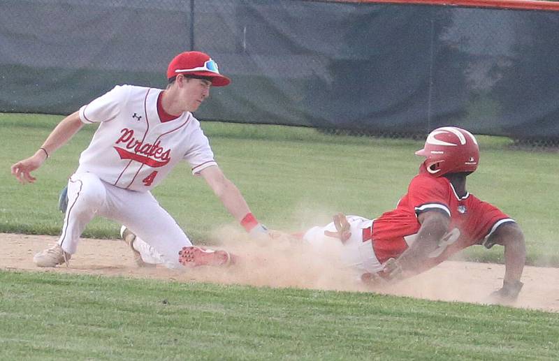 Ottawa's Colt Bryson misses a tag on Streator's Jordan Lukes at second base during the Class 3A Regional semifinal game on Thursday, May 29, 2025 at Pontiac High School.