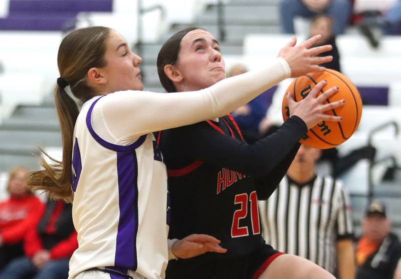 Huntley’s Luca Garlin, right, works past Hampshire’s Sadie Van Horn in varsity girls basketball on Wednesday, Feb. 11, 2026, at Hampshire High School in Hampshire.