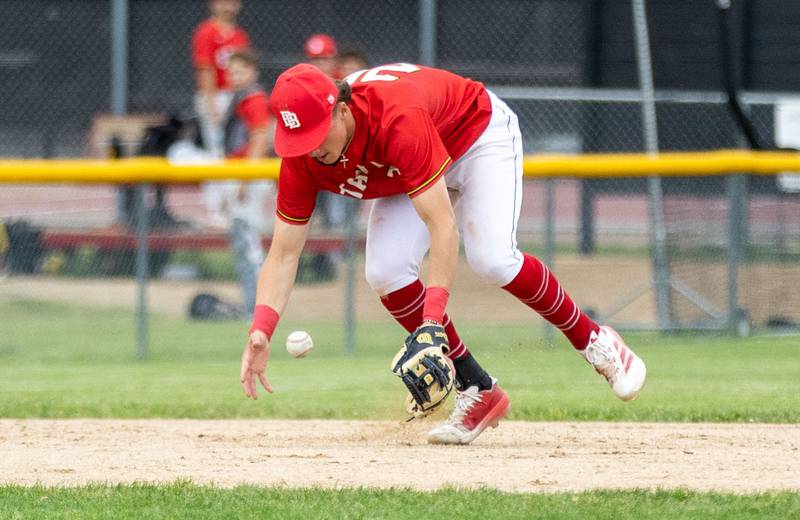 Batavia third baseman Darren Barnes fumbles with a ground ball during the Class 4A Regional semifinal against St. Charles North at Batavia High School in Batavia on Thursday, May 29, 2025.