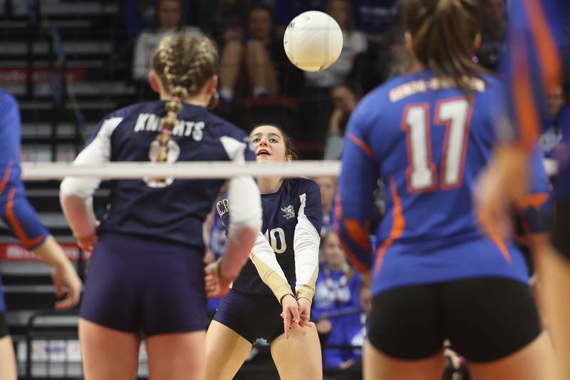 IC Catholic’s Natalie Lawton receives a serve against Genoa-Kingston in the Class 2A championship match on Saturday in Normal.