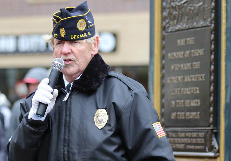 United States Air Force Veteran Michael Embry speaks in front of the newly renovated Soldiers and Sailors Memorial Clock Thursday, Nov. 11, 2021, during a Veterans Day and clock rededication ceremony at Memorial Park in downtown DeKalb.