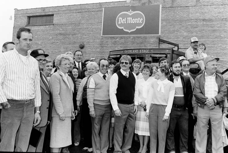 Former Del Monte employees stand with former Illinois Gov. Jim Thompson as he arrives for breakfast on Friday, Oct. 18, 1985 in Mendota. The governer was in town for a ceremony to commemorate the opening of Interstate I-39 between Mendota and Rochelle.