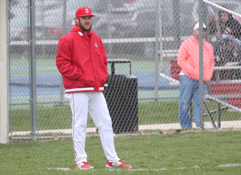 Ottawa head baseball coach Levi Ericson coaches his team against Hall on Tuesday, April 1, 2025 at Ottawa High School.