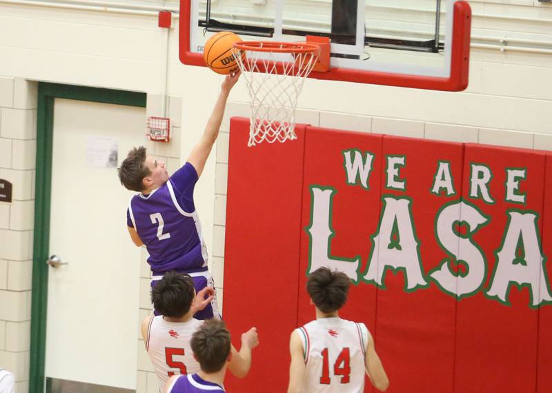 Rochelle's Van Gerber runs in the lane to score on a layup against L-P's Erick Sotelo on Friday, Feb. 13, 2026 in Sellett Gymnasium at L-P High School.
